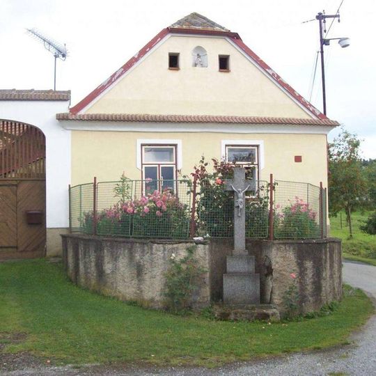 Kříž v zahradě v Ohradě