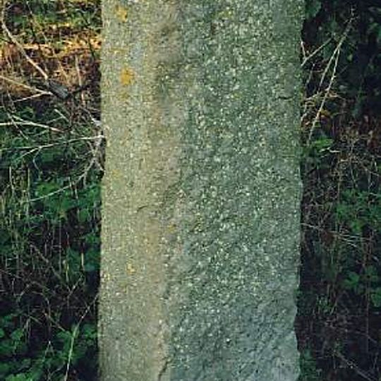 Milestone, N side of entrance to church