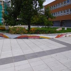 Mosaic circle in front of Brdičkova school