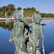 Deux Amours et une fillette tenant un miroir