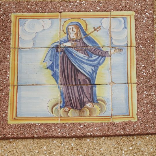 Ceramic panel of Our Lady of the Sorrows at 19 Justo Zaragoza square