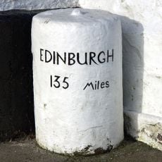 Milestones Flanking Steps To Entrance Of Number 128