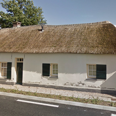 Witgepleisterde boerderij