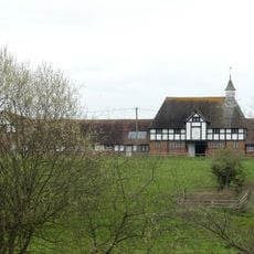 L-shaped range of farmbuildings at Cheaveley Hall Farm