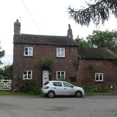 Stone Cottage and attached outbuilding and boundary wall