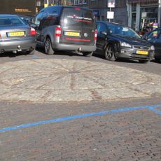 Stervormig mozaïek in de Stenen Brug