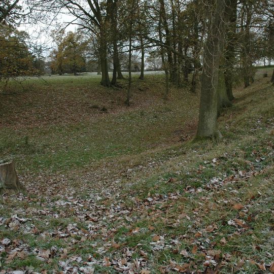 Rock Farm moated site, deserted medieval village and ridge and furrow, 100m SE of St Peter and St Paul's Church
