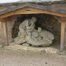 Socha svatého Jeronýma u zdi zahrady špitálu v Kuksu