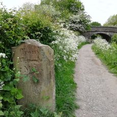 Milestone on towpath south of canal bridge number 25