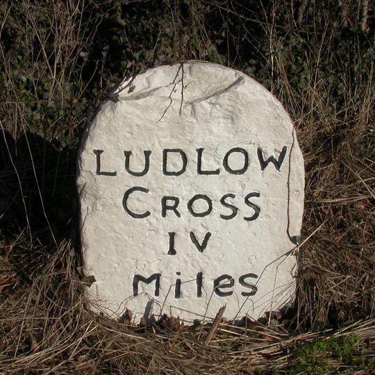 Milestone, Wooton; 300m E Henbrook Cottages opp northbound lay-by